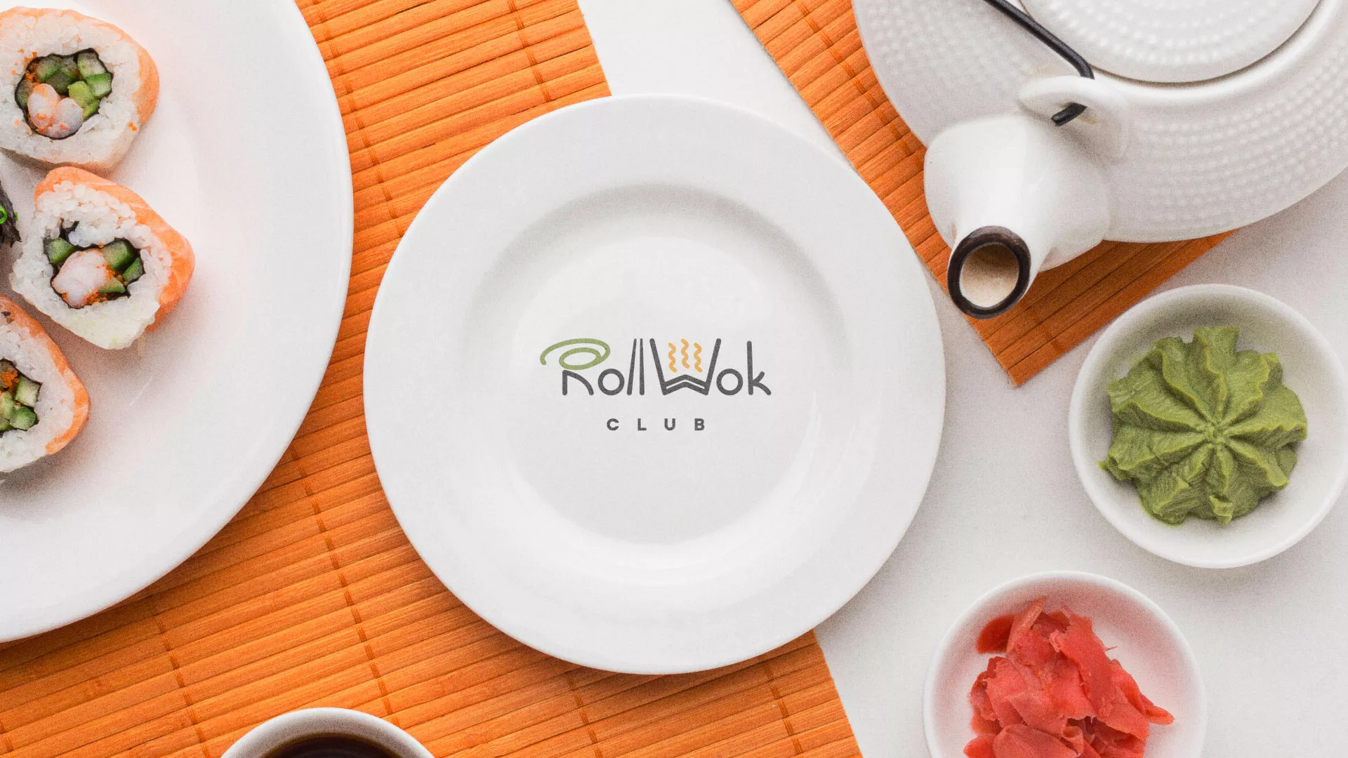 Разработка логотипа и фирменного стиля суши-бара «Roll Wok Club» в Игарке